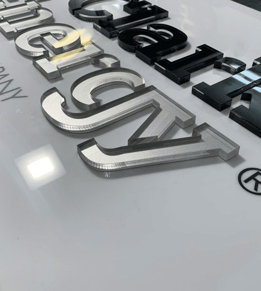 Custom laser-cut acrylic dimensional lettering